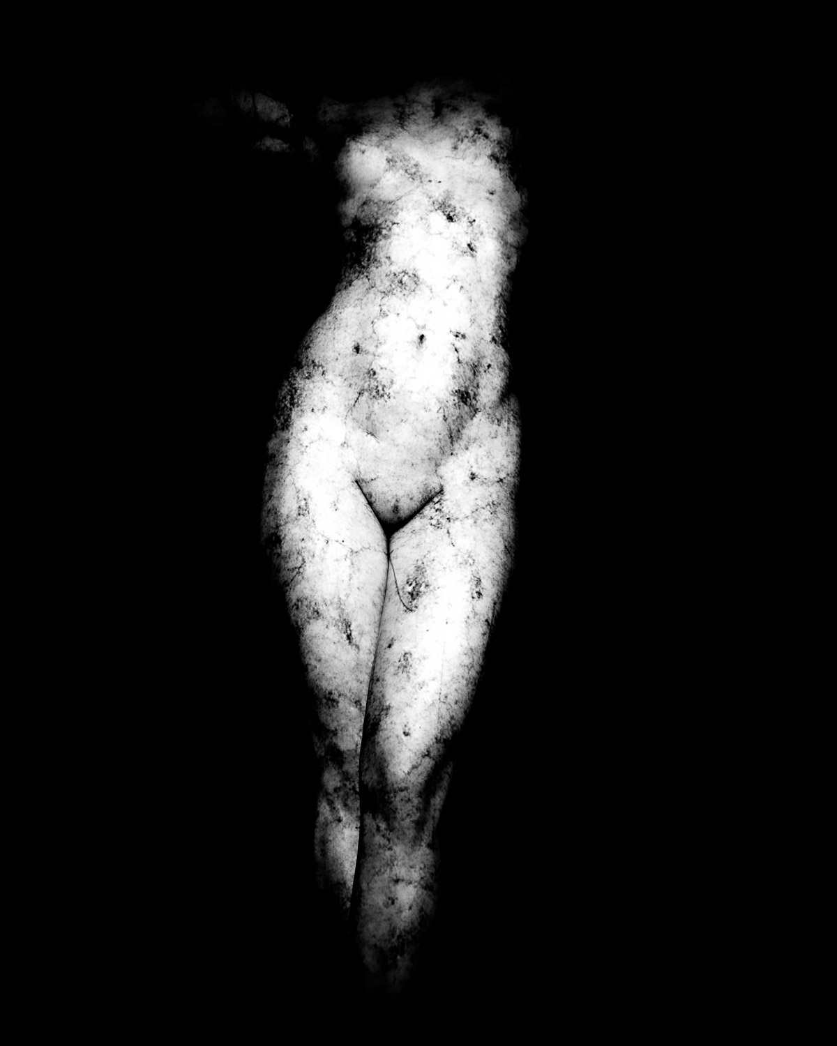 abstract fine art photograph showing a textured form with strong contrasts and fragmented surface patterns